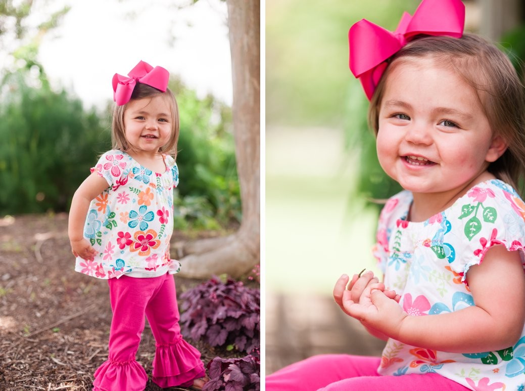 little girl in pink smiling