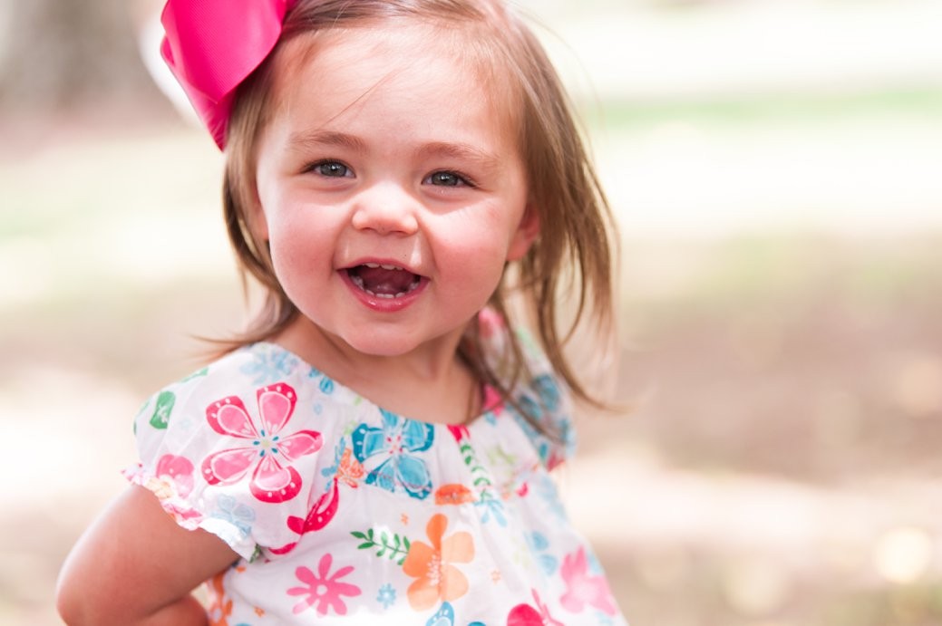 little girl with pink bow