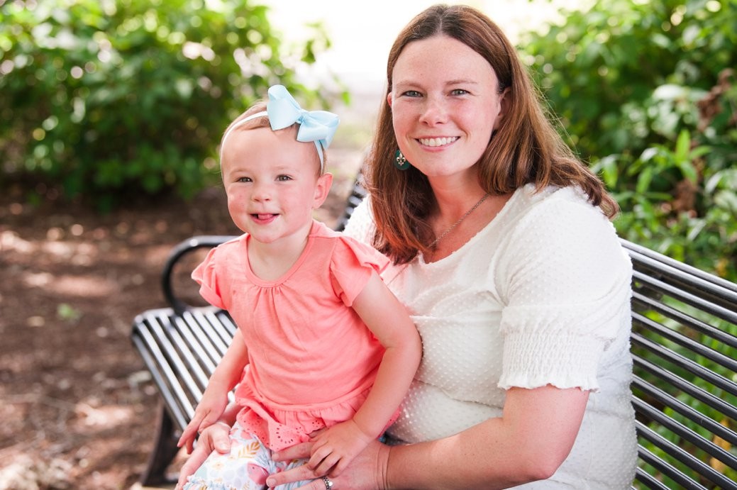 mom with little girl in coral