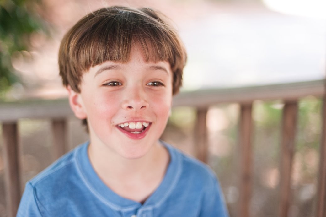 little boy in blue shirt