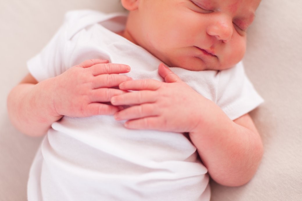 close up baby hands