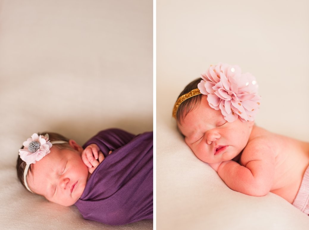 baby in purple wrap and pink bow