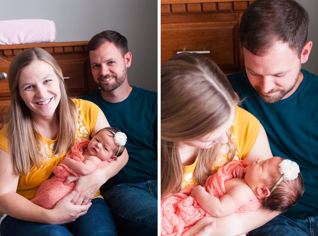 parents with newborn in peach