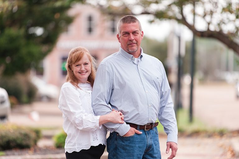 downtown wedding couple standing together on street