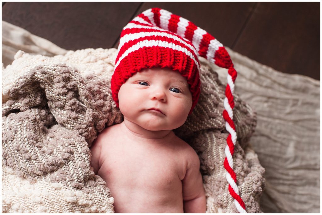 Newborn Family Session baby in Christmas hat