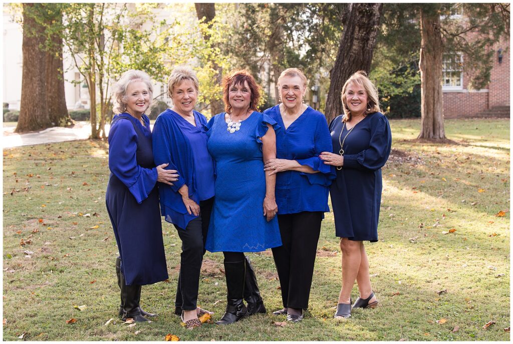 grown sisters wearing blue