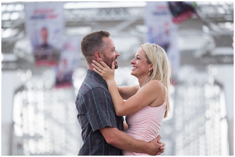 couple Nashville TN wedding proposal on bridge